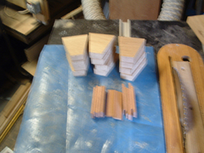 This picture shows the oak segments with mahogany inserts ready to be glued.